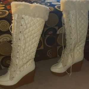 Knee high wedged boots